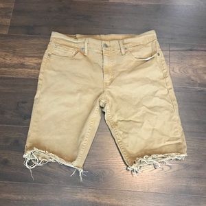 Levi’s 511 tan distressed hem shorts